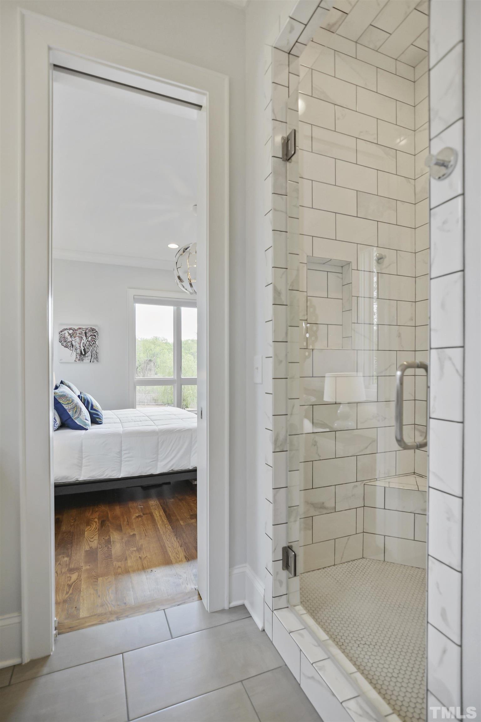 1012 Canterbury Road Raleigh, NC 27607 - Photo 26 of 51 a bathroom with a bathtub and shower