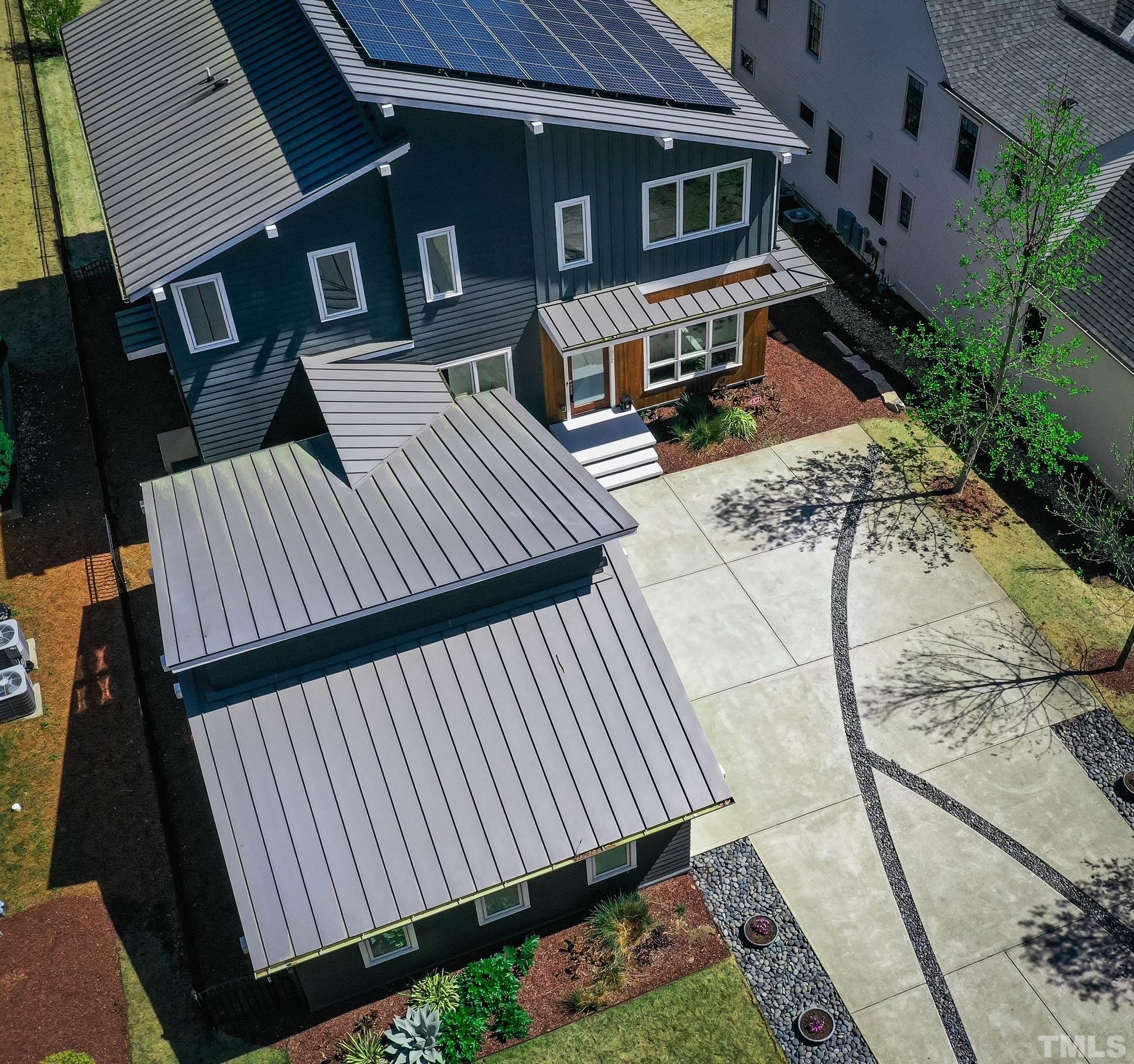 1012 Canterbury Road Raleigh, NC 27607 - Photo 48 of 51 a view of a patio with table and chairs with wooden floor and fence