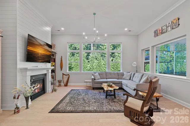 a living room with furniture and a table