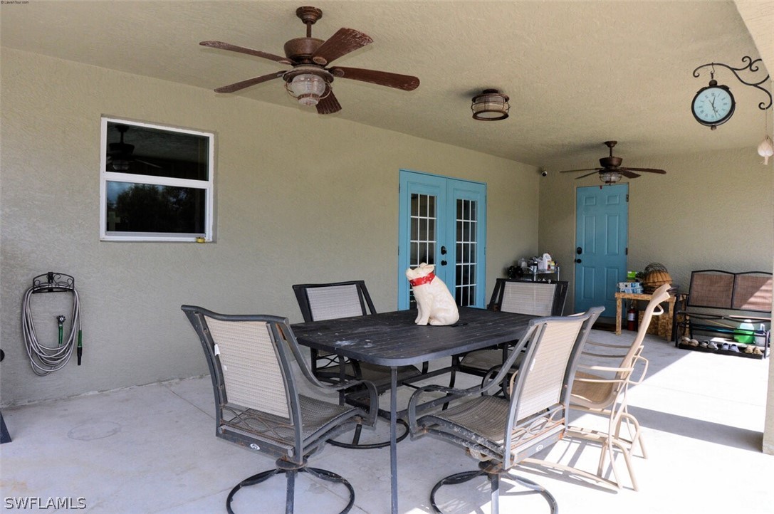 2041 Rialto Way Alva, FL 33920 - Photo 22 of 32 a view of a dining room with furniture