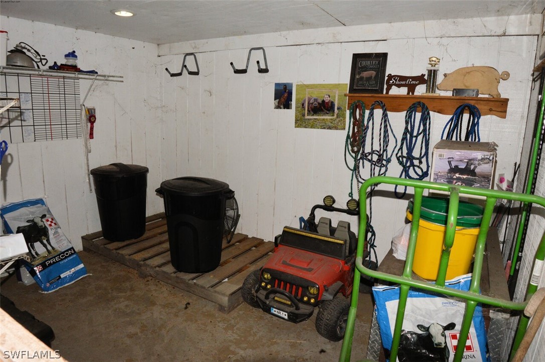 2041 Rialto Way Alva, FL 33920 - Photo 30 of 32 a view of a room with lots of stuff and hardwood floor