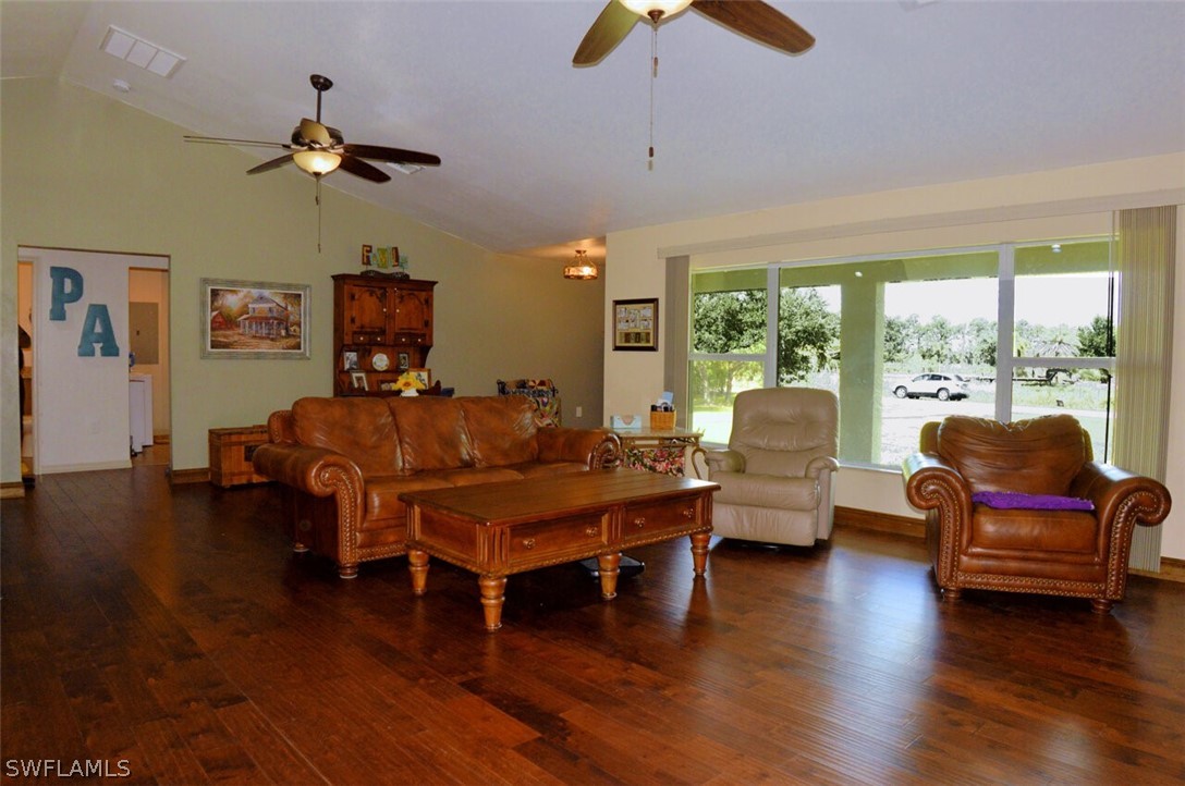 2041 Rialto Way Alva, FL 33920 - Photo 7 of 32 a living room with furniture and a large window