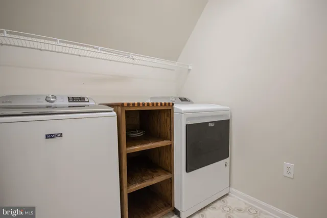 a view of a backyard of a house