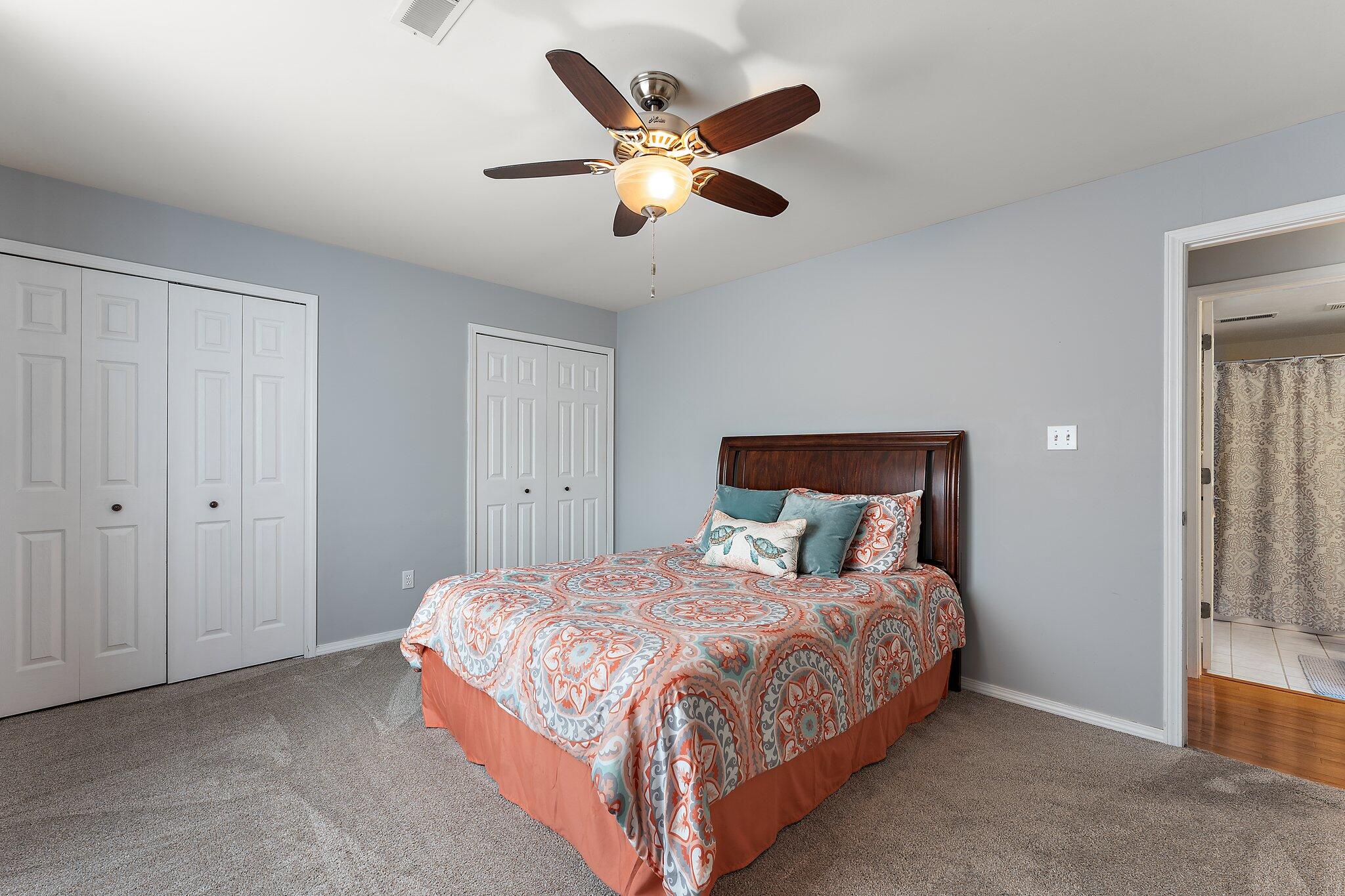 406 Sturdy Road, Unit 1A Valparaiso, IN 46383 - Photo 13 of 16 a bedroom with a bed and a ceiling fan