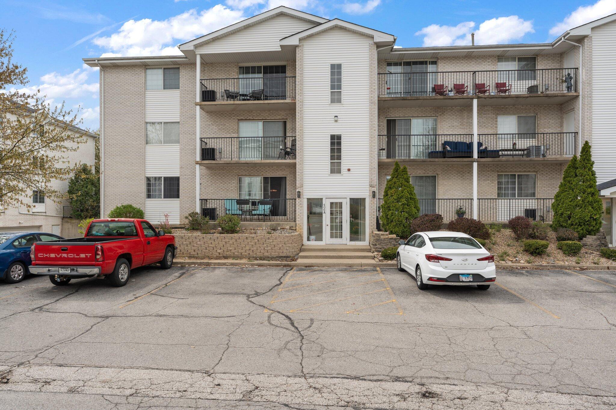 406 Sturdy Road, Unit 1A Valparaiso, IN 46383 - Photo 16 of 16 a car parked in front of a houses