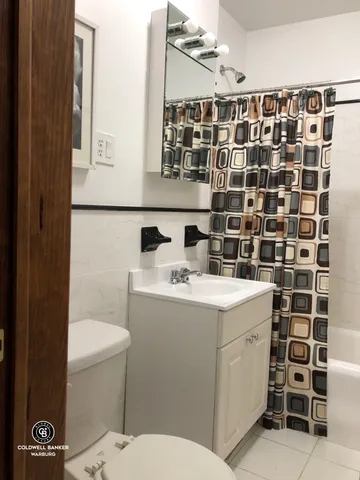a bathroom with a sink and a toilet