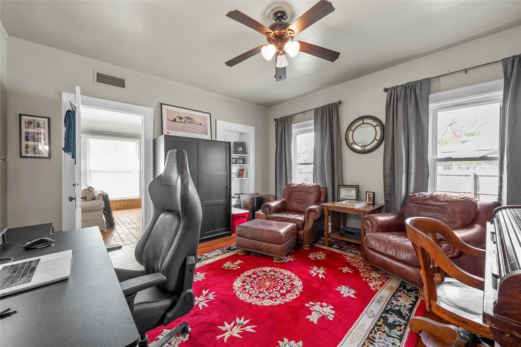 2326 Parrott Avenue Waco, TX 76707 - Photo 20 of 37 a living room with furniture a flat screen tv and a window