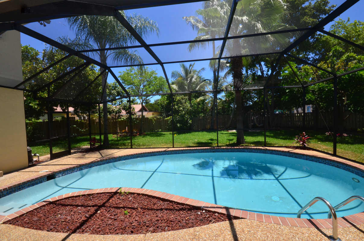 98 Southwest 12th Way Boca Raton, FL 33486 - Photo 17 of 18 Screened Pool
