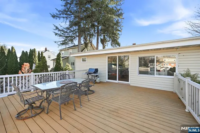 a view of a deck with furniture