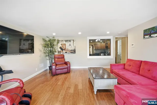 a spacious bathroom with a granite countertop sink mirror and double