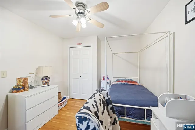 a view of a dining room with furniture and a kitchen view