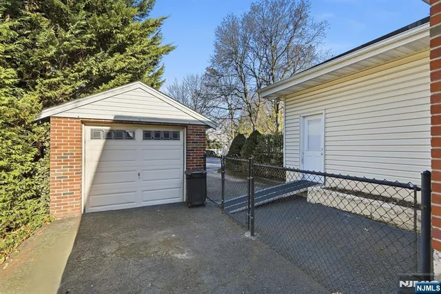 a front view of a house with a garage