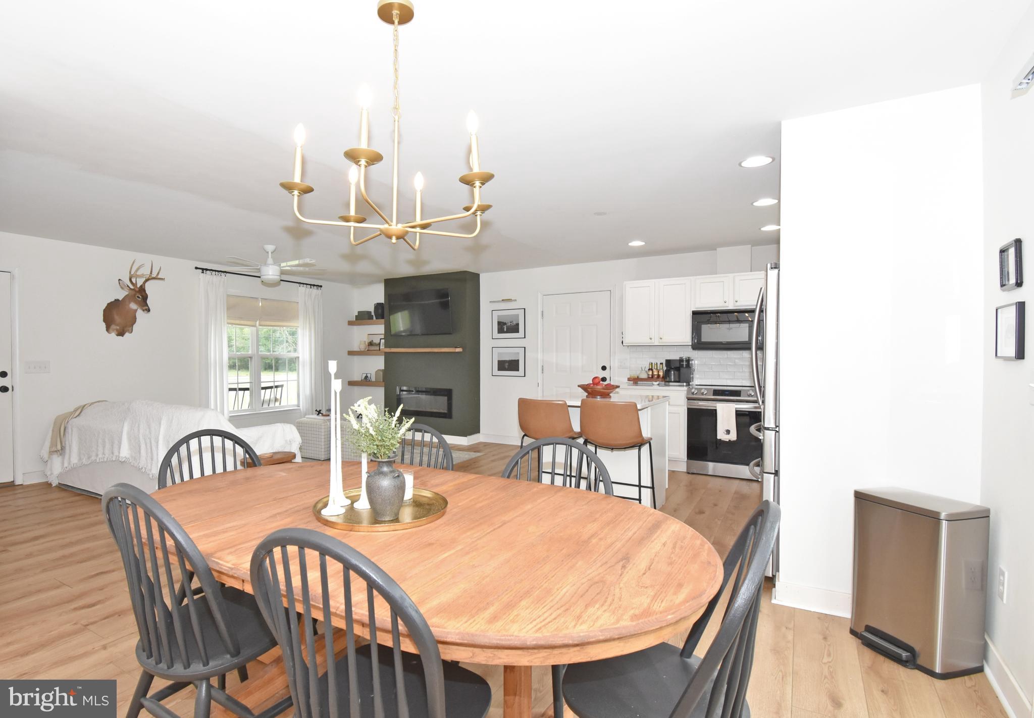 6600 Old Westover Marion Road Westover, MD 21871 - Photo 15 of 52 a view of a dining room with furniture