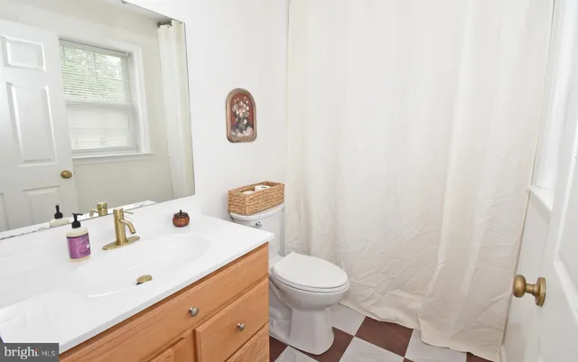 a bathroom with a sink and a toilet