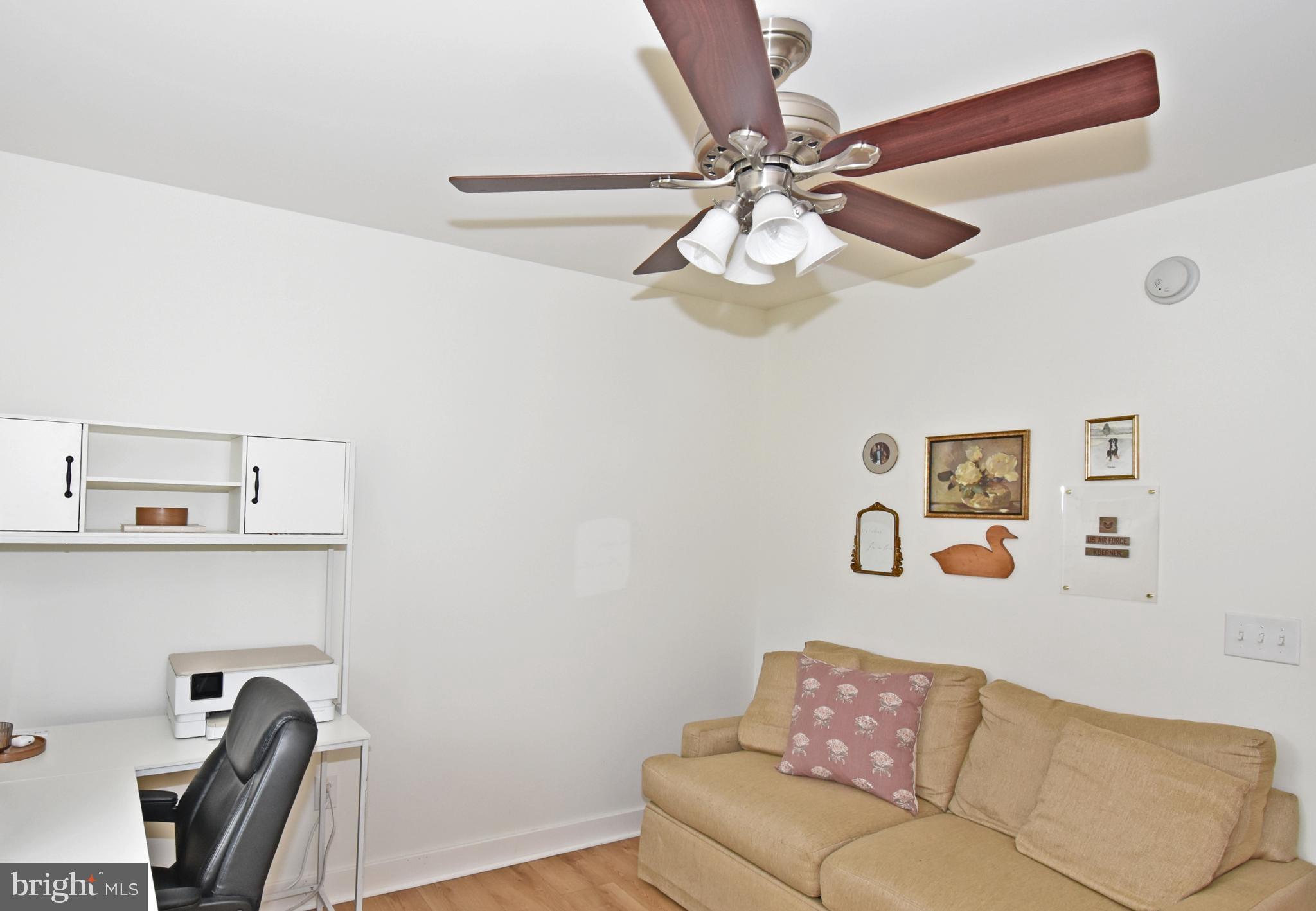6600 Old Westover Marion Road Westover, MD 21871 - Photo 32 of 52 a living room with couch and a fan