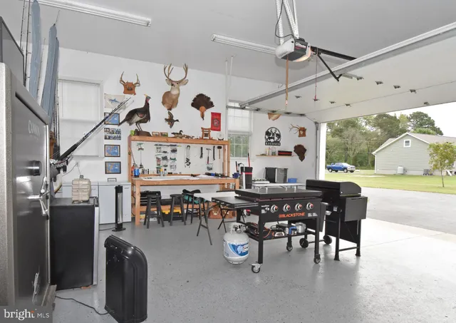 a front view of house with yard outdoor seating and green space