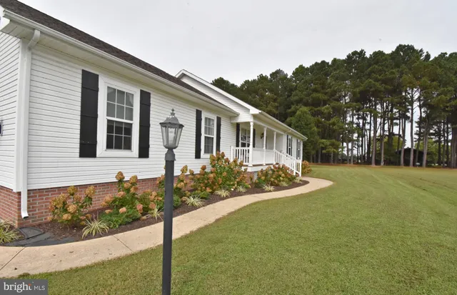 a view of balcony with furniture