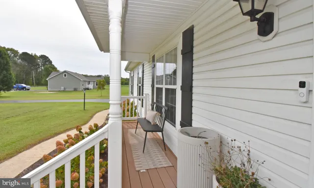 a view of a big yard with an trees