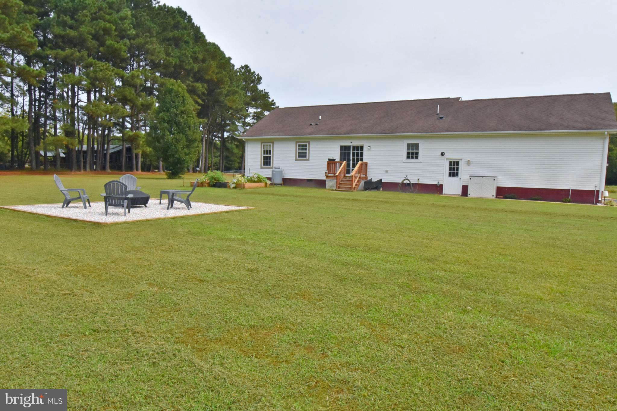 6600 Old Westover Marion Road Westover, MD 21871 - Photo 45 of 52 a view of a swimming pool with a yard