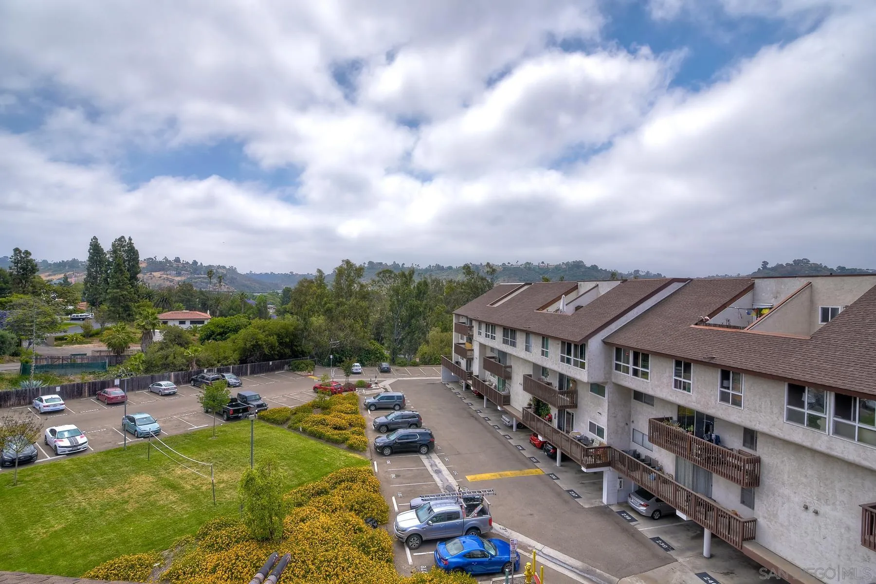 6151 Rancho Mission Road, Unit 317 San Diego, CA 92108 - Photo 22 of 31 a view of a city with tall buildings