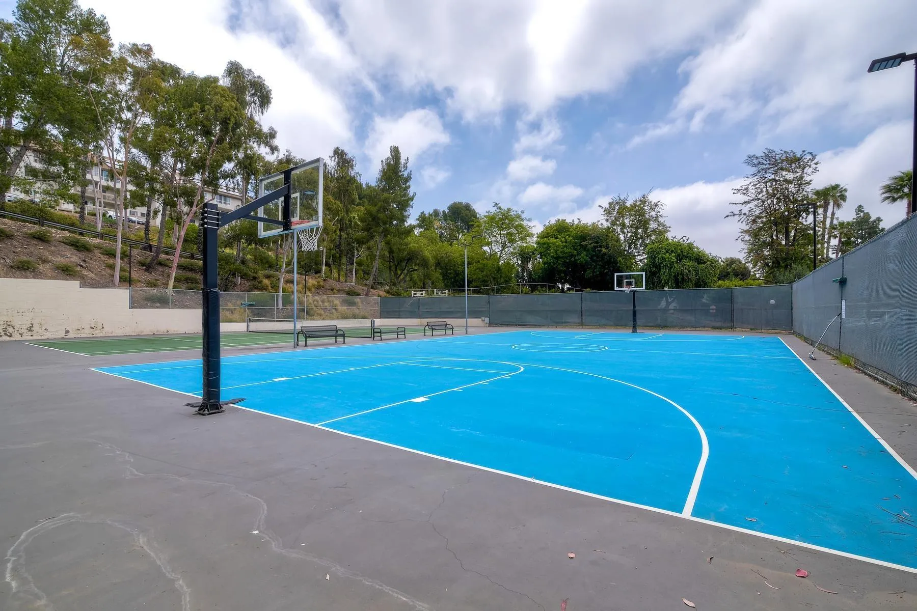6151 Rancho Mission Road, Unit 317 San Diego, CA 92108 - Photo 28 of 31 a view of a tennis court