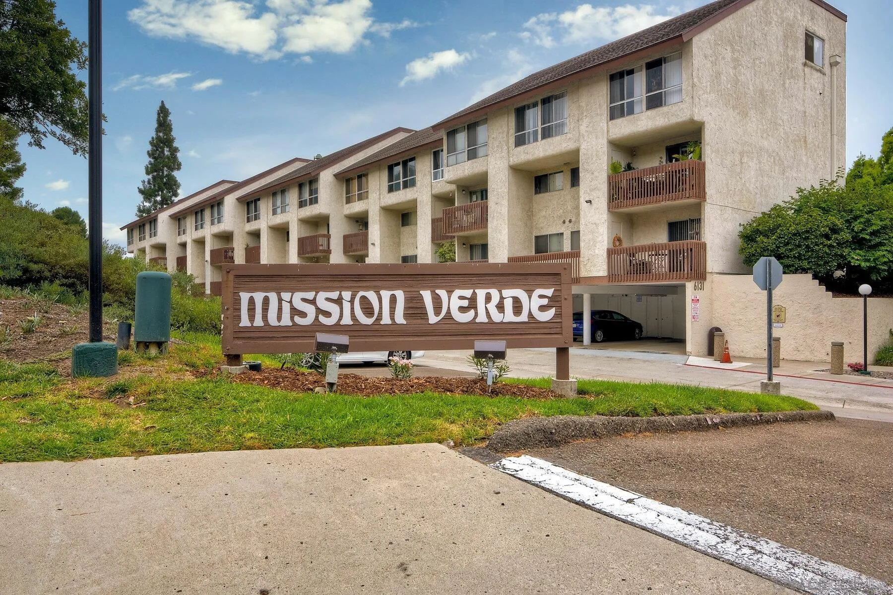 6151 Rancho Mission Road, Unit 317 San Diego, CA 92108 - Photo 31 of 31 a view of a building with a street