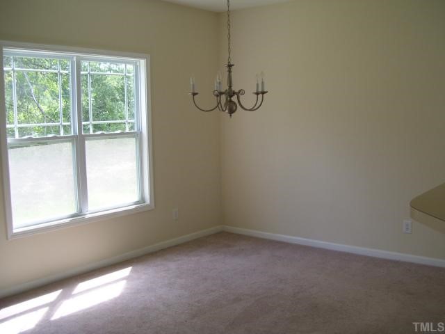 3544 Sunbright Lane Raleigh, NC 27610 - Photo 2 of 9 a view of a window in a room