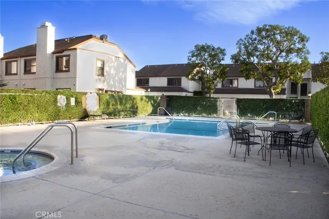a view of house with a outdoor space and sitting space