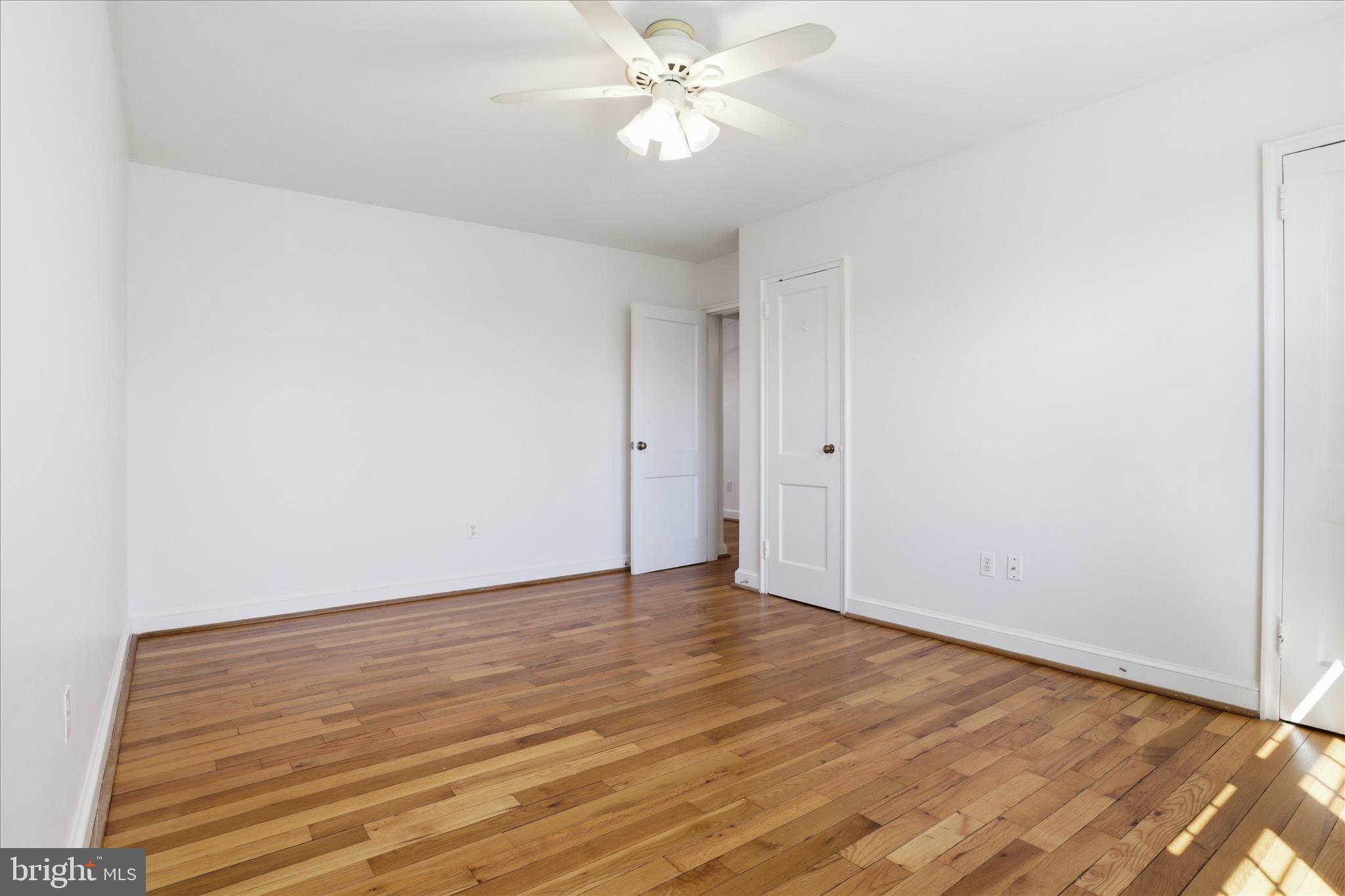1305 South Walter Reed Drive, Unit 201 Arlington, VA 22204 - Photo 8 of 17 Beautiful pine hardwood floors, spacious closet