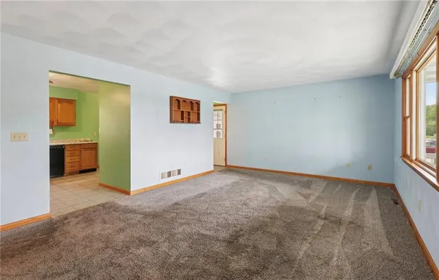 an empty room with windows