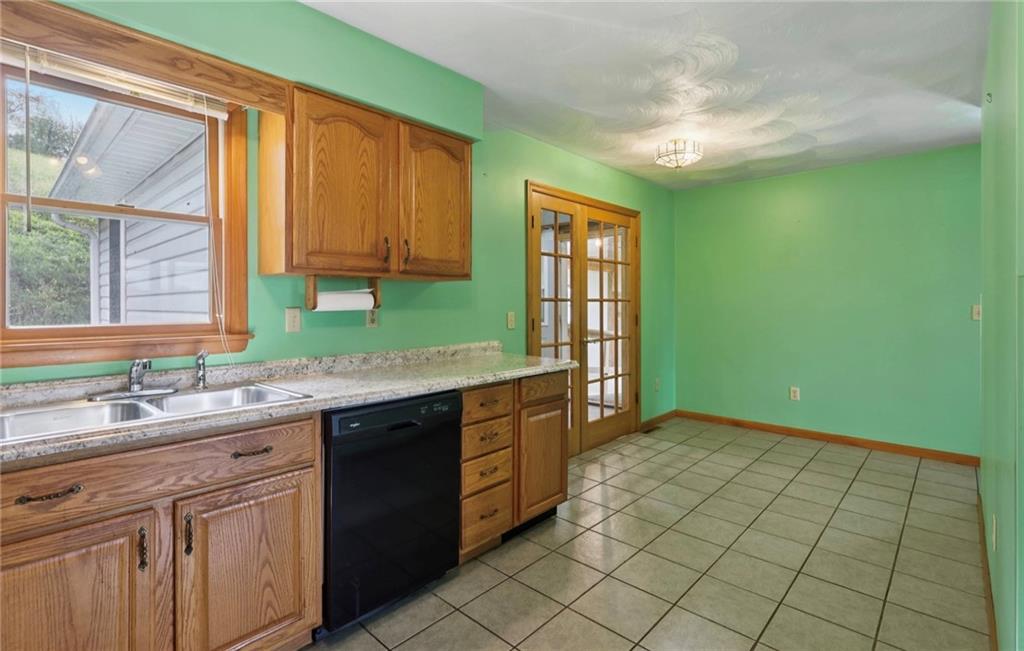 487 East Brady Road Kittanning, PA 16201 - Photo 13 of 50 a kitchen with a sink and a window
