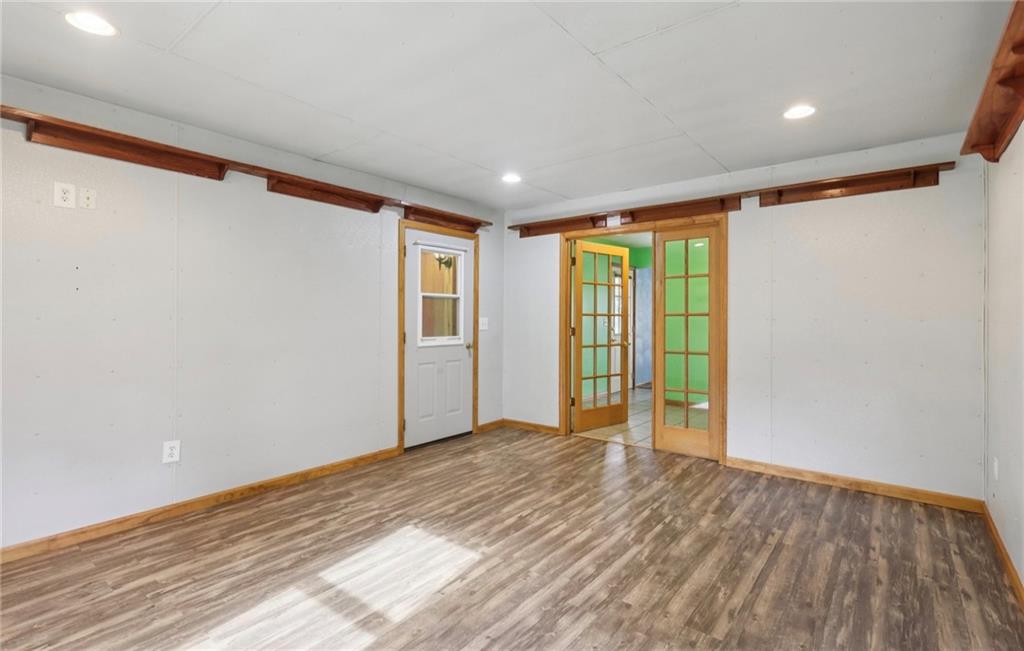 487 East Brady Road Kittanning, PA 16201 - Photo 20 of 50 a view of empty room with wooden floor and fan