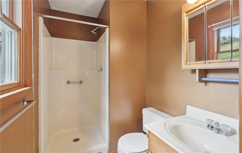 487 East Brady Road Kittanning, PA 16201 - Photo 30 of 50 a bathroom with a sink toilet and shower