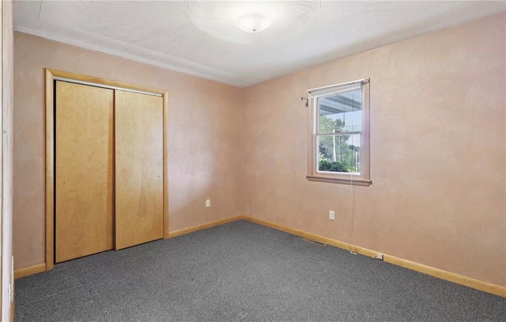 487 East Brady Road Kittanning, PA 16201 - Photo 35 of 50 an empty room with windows and closet