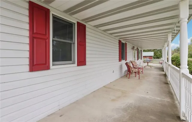 a view of a chairs with porch