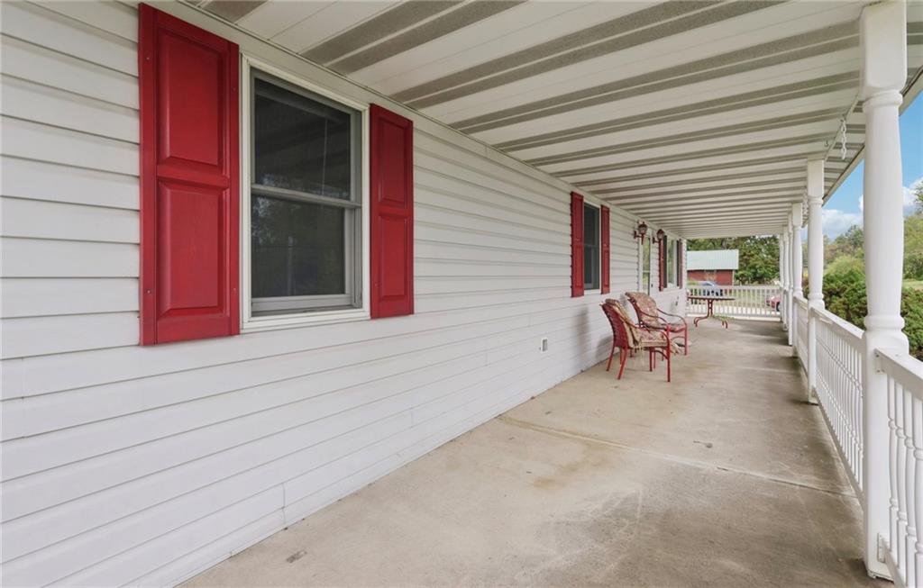 487 East Brady Road Kittanning, PA 16201 - Photo 7 of 50 a view of a chairs with porch