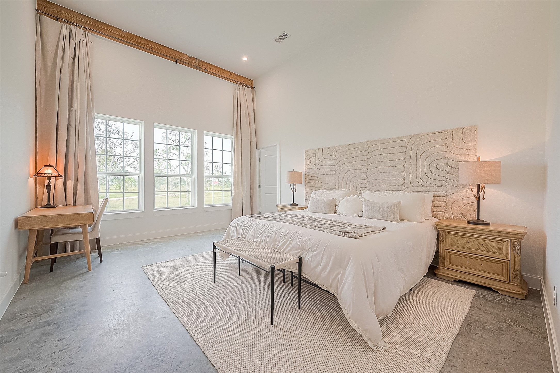 1295 Brazos River Road Freeport, TX 77541 - Photo 17 of 29 a bedroom with a bed and a large window