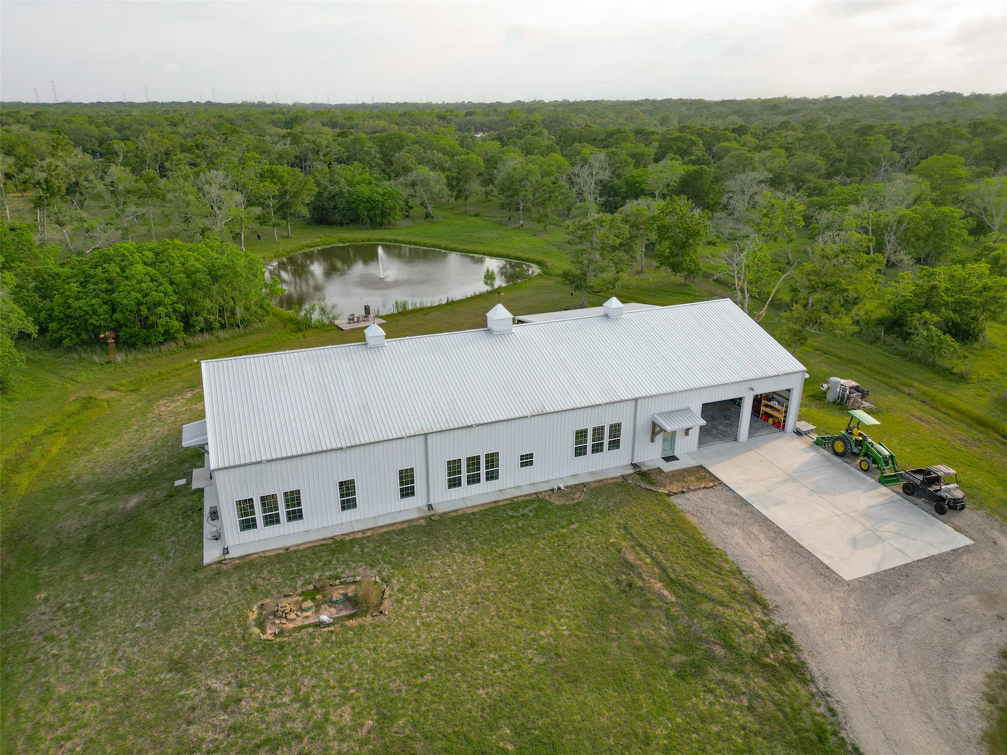 1295 Brazos River Road Freeport, TX 77541 - Photo 2 of 29 aerial view of a house with pool and a yard