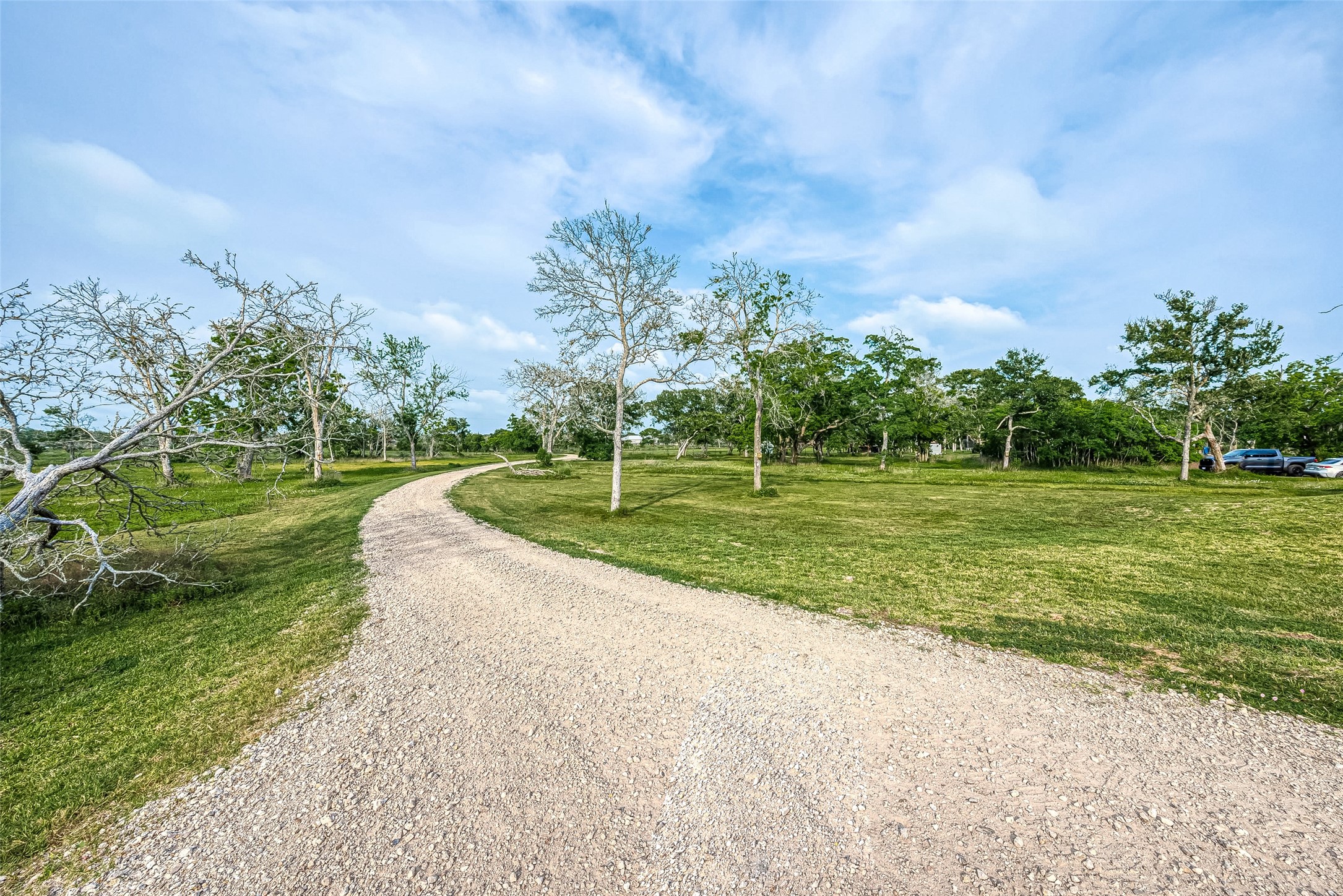 1295 Brazos River Road Freeport, TX 77541 - Photo 29 of 29 a view of a golf course with a garden