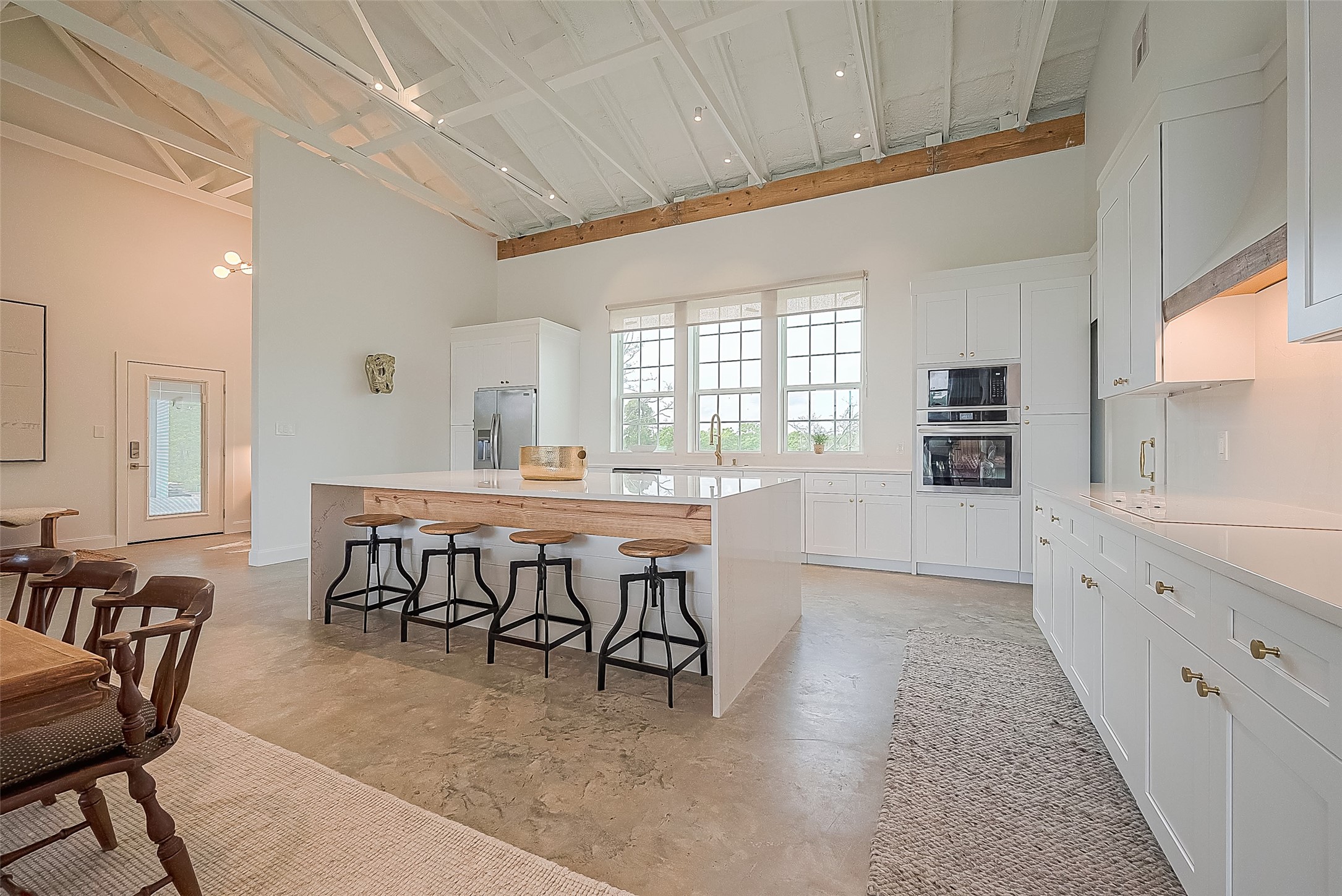 1295 Brazos River Road Freeport, TX 77541 - Photo 8 of 29 a view of a dining room with furniture window and wooden floor