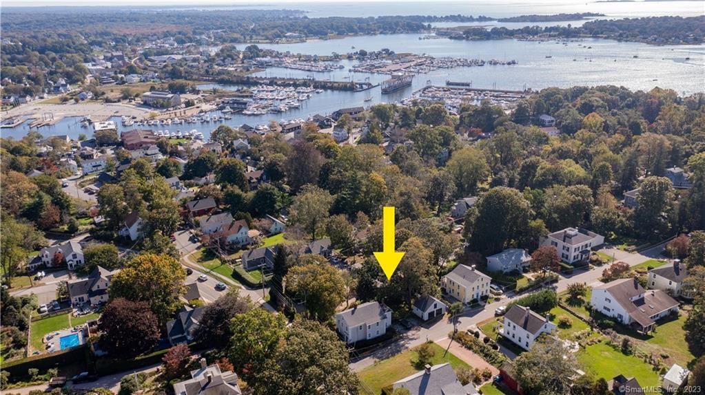 25 New London Road Groton, CT 06355 - Photo 1 of 1 an aerial view of a houses with a swimming pool