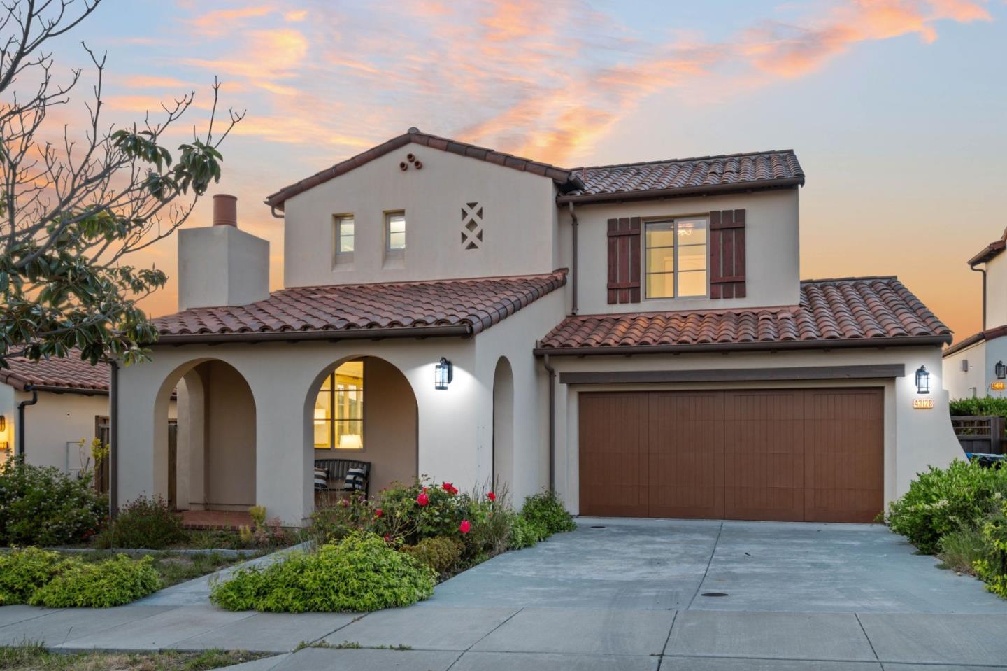 43128 Palm Place Fremont, CA 94539 - Photo 1 of 1 a front view of a house with plants