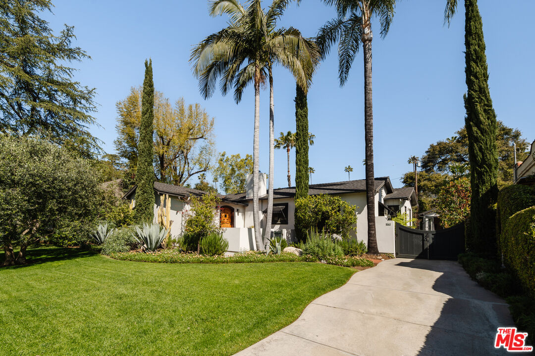 1175 Sonoma Drive Altadena, CA 91001 - Photo 2 of 68 a view of a palm trees in front of a house