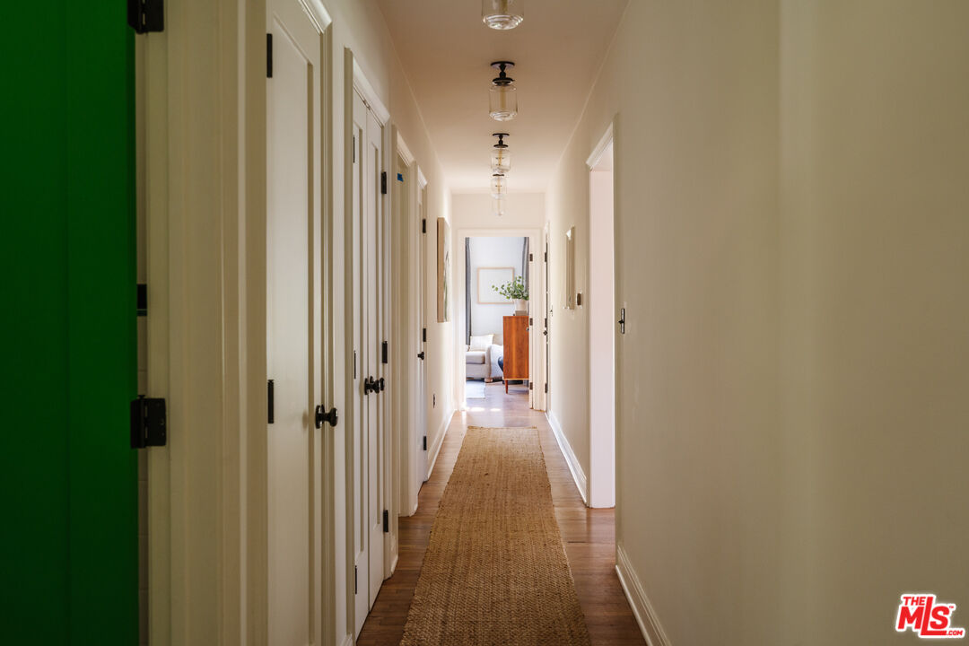 1175 Sonoma Drive Altadena, CA 91001 - Photo 22 of 68 a view of a hallway with wooden floor