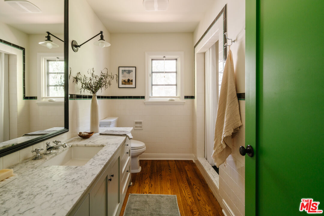 1175 Sonoma Drive Altadena, CA 91001 - Photo 23 of 68 a bathroom with a sink and a mirror