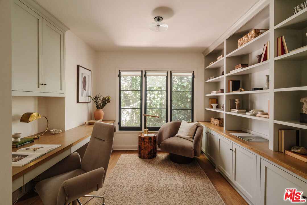 1175 Sonoma Drive Altadena, CA 91001 - Photo 25 of 68 a living room with furniture and a floor to ceiling window