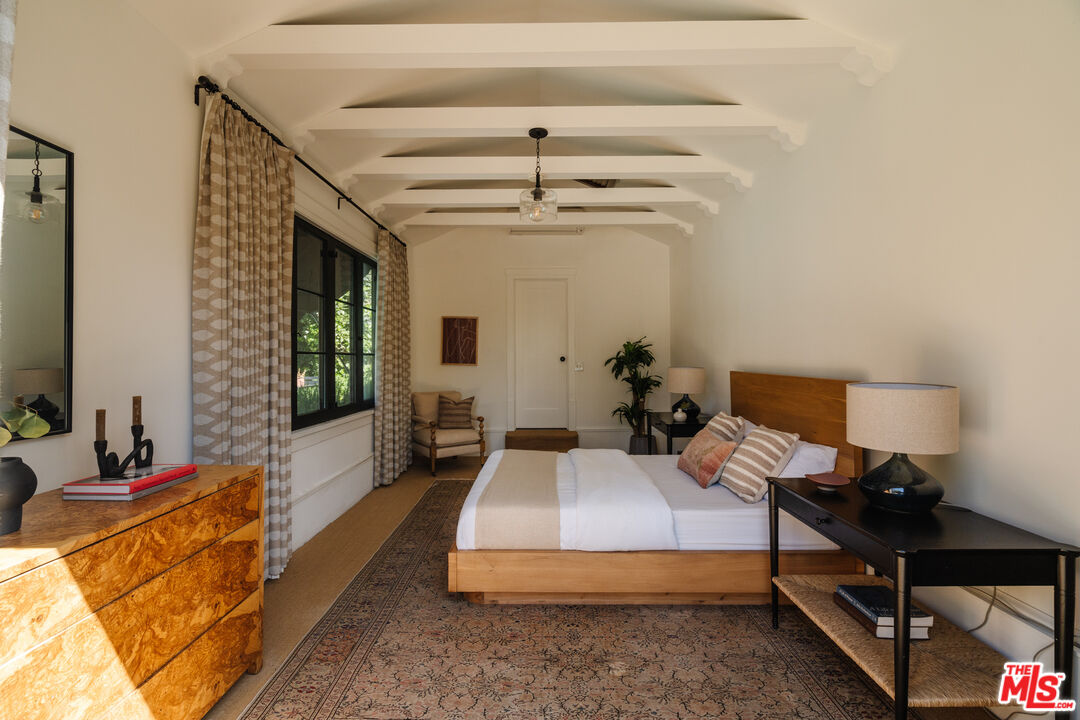 1175 Sonoma Drive Altadena, CA 91001 - Photo 43 of 68 a spacious bedroom with a bed and wooden floor