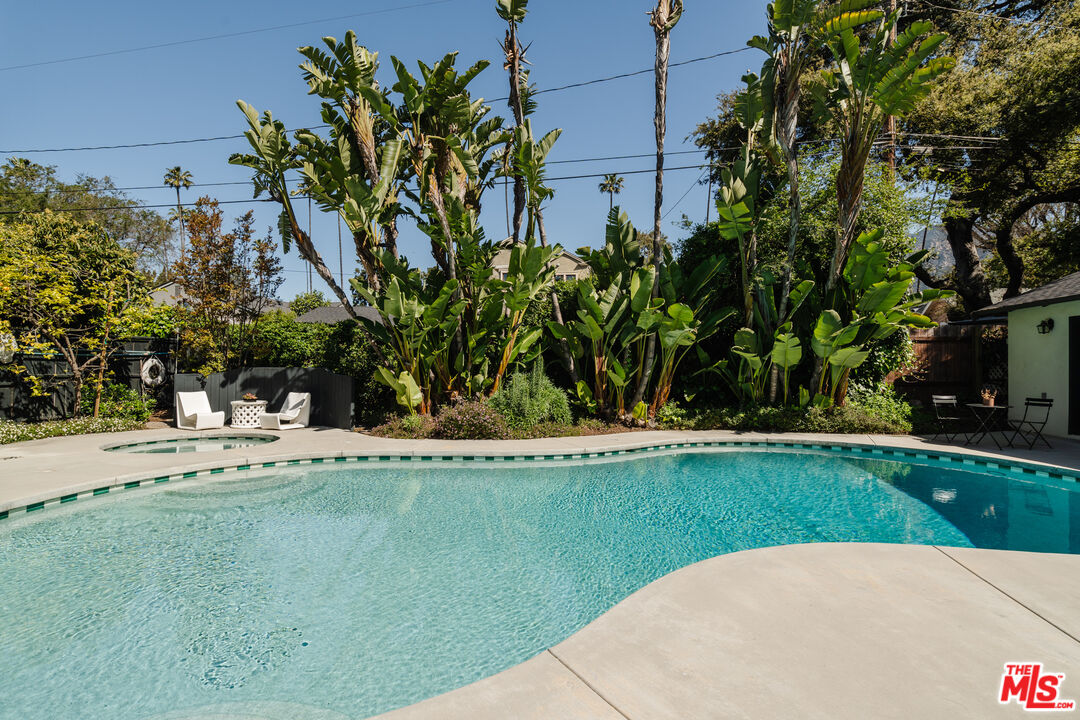 1175 Sonoma Drive Altadena, CA 91001 - Photo 51 of 68 a view of a swimming pool with a yard