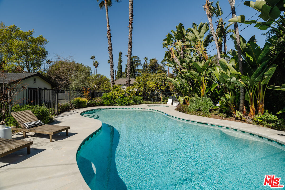 1175 Sonoma Drive Altadena, CA 91001 - Photo 52 of 68 a view of a swimming pool with a lounge chair