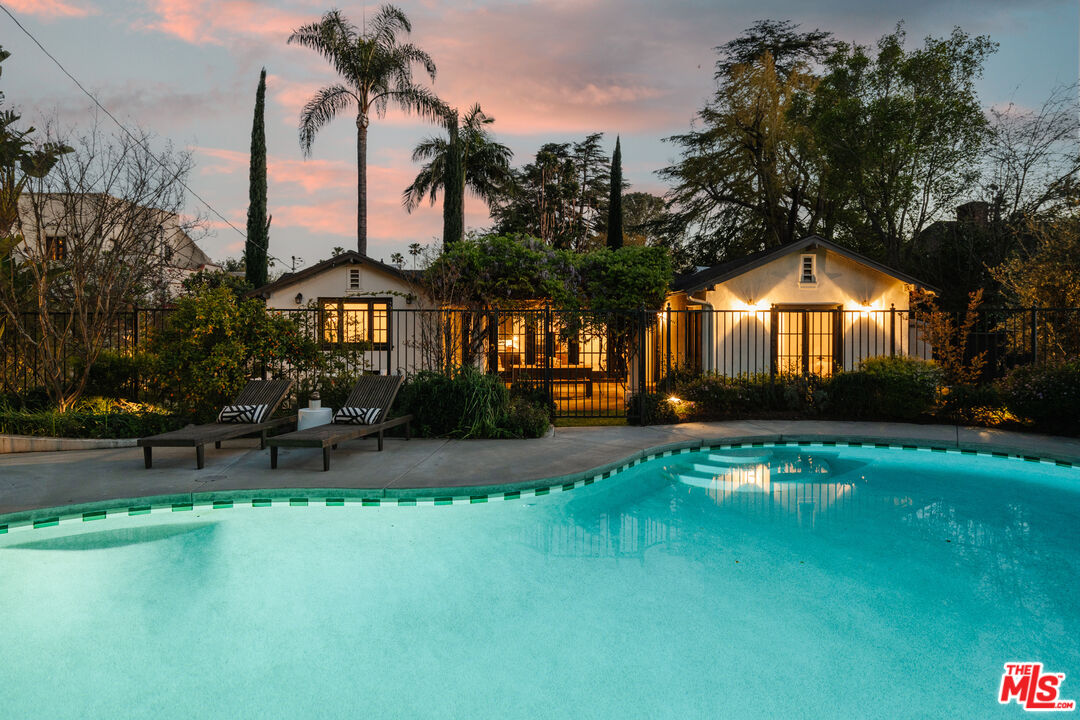 1175 Sonoma Drive Altadena, CA 91001 - Photo 67 of 68 a front view of a house with a yard table and chairs